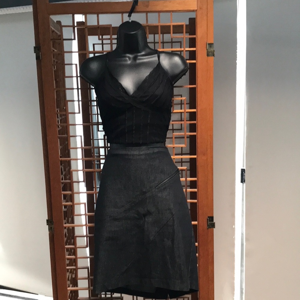NWOT- Dress Barn size 12 black denim-like skirt with stylish zipper detail.